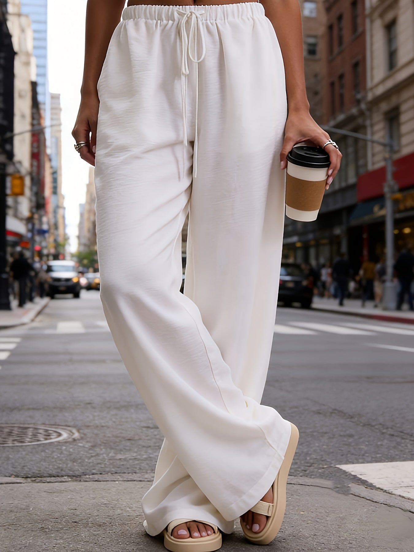 The Essence of Summer Ease: The Sculpted Wide-Leg Trouser
